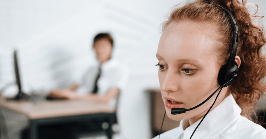 Freelance Recruiter Speaking With Prospective Employee Over Headset